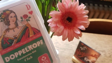 Kneipen-Doppelkopf im Gastfeld mit Fischplakat