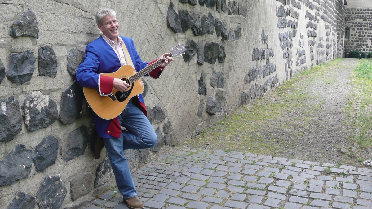 Titelbild der Veranstaltung „Vun Fraulück em Vringsveedel“ – Musikalischer Spaziergang mit Günter Schwanenberg