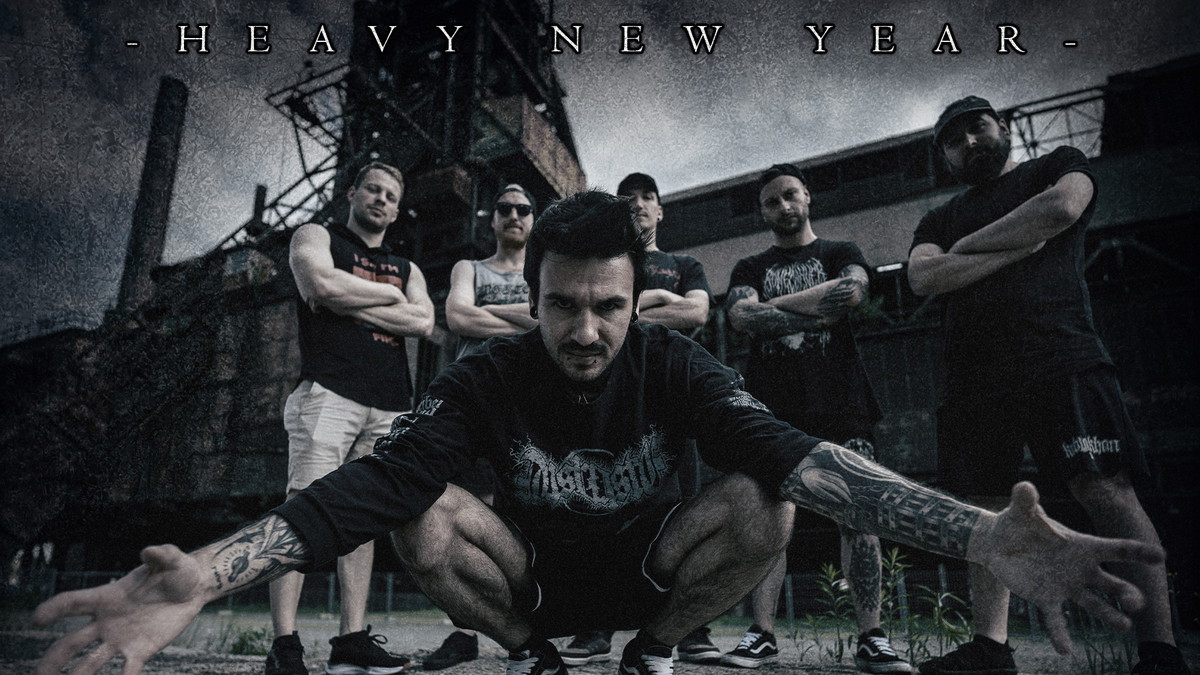 The Picture shows the Band Members of Served Cold as well as the title of the advertised Event "Heavy New Year".